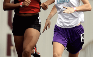 Photo of two women running 